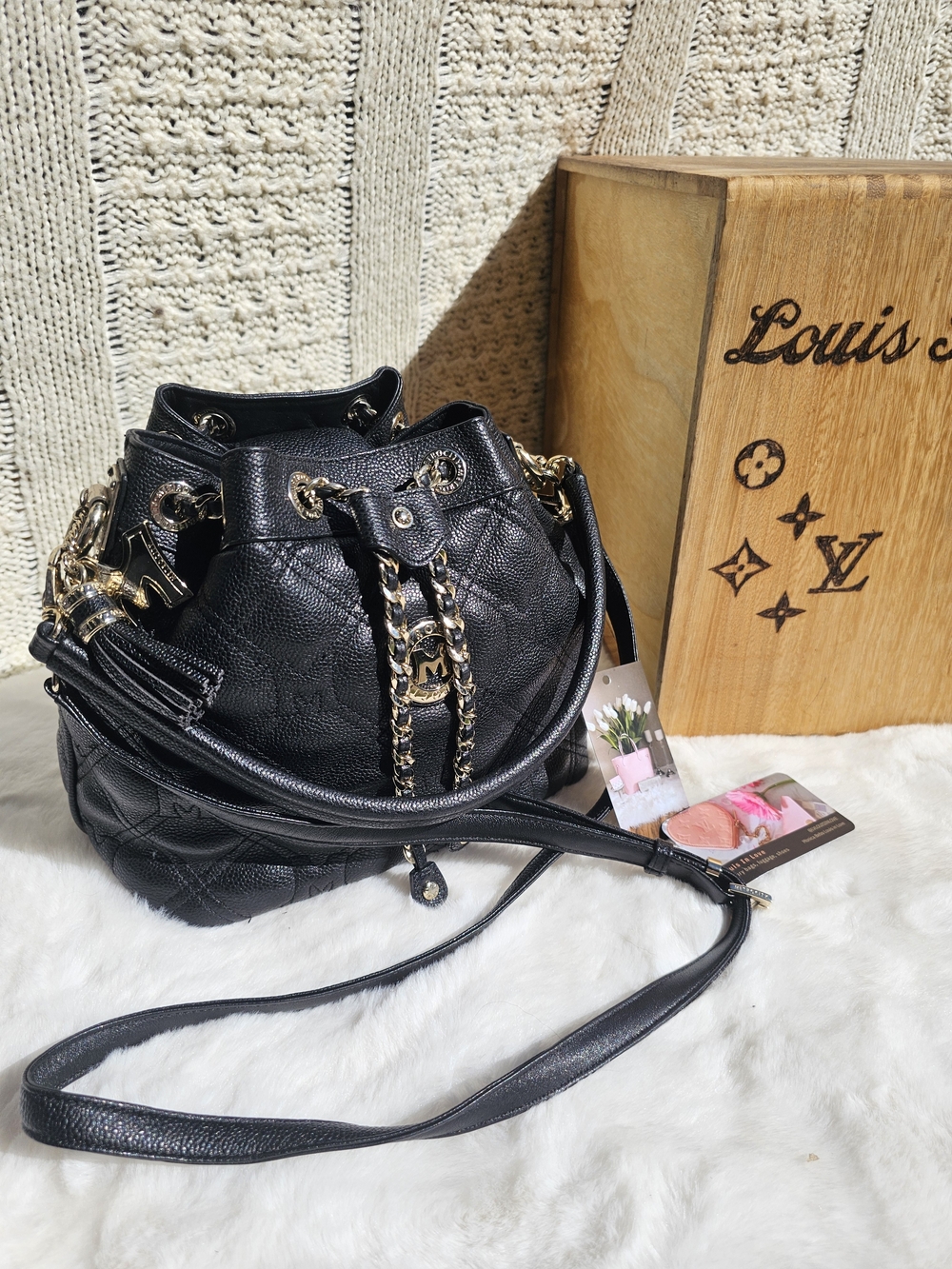 Black Quilted Leather Drawstring Shoulder Bucket Bag with Gold Chain Detail